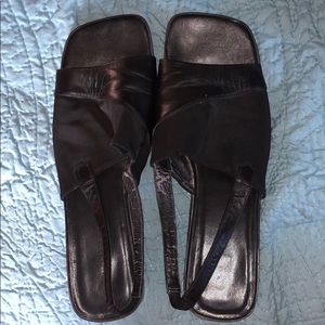 Black slide ons with a heel